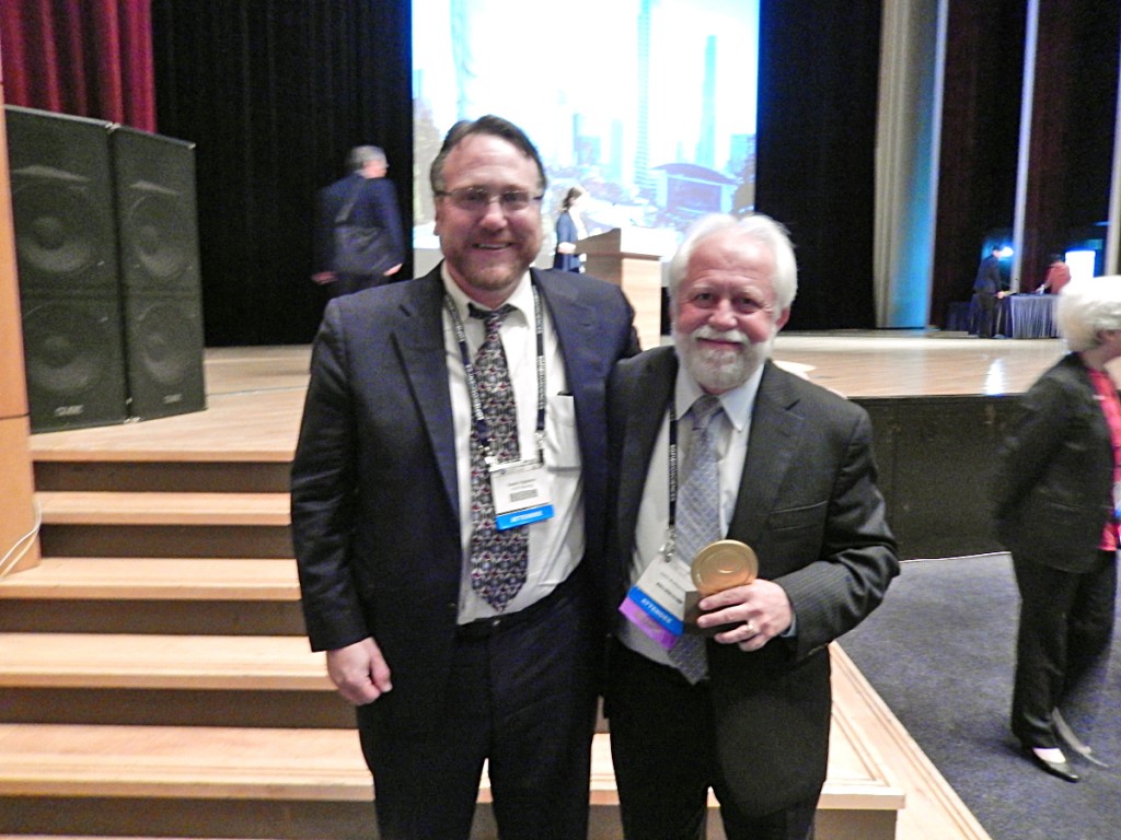 (l) Dan Vigneron, PhD and (r) John Kurhanewicz, PhD, following their acceptance of the World Molecular Imaging Society Gold Medal at the annual World Molecular Imaging Congress, Sept. 17-20, 2014 in Seoul Korea (not present: Sarah Nelson, PhD)