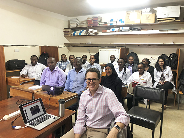 Marc Kohli, MD (center) has had a long-term partnership with Moi University in Kenya since he was a resident with Indiana University in 2005.