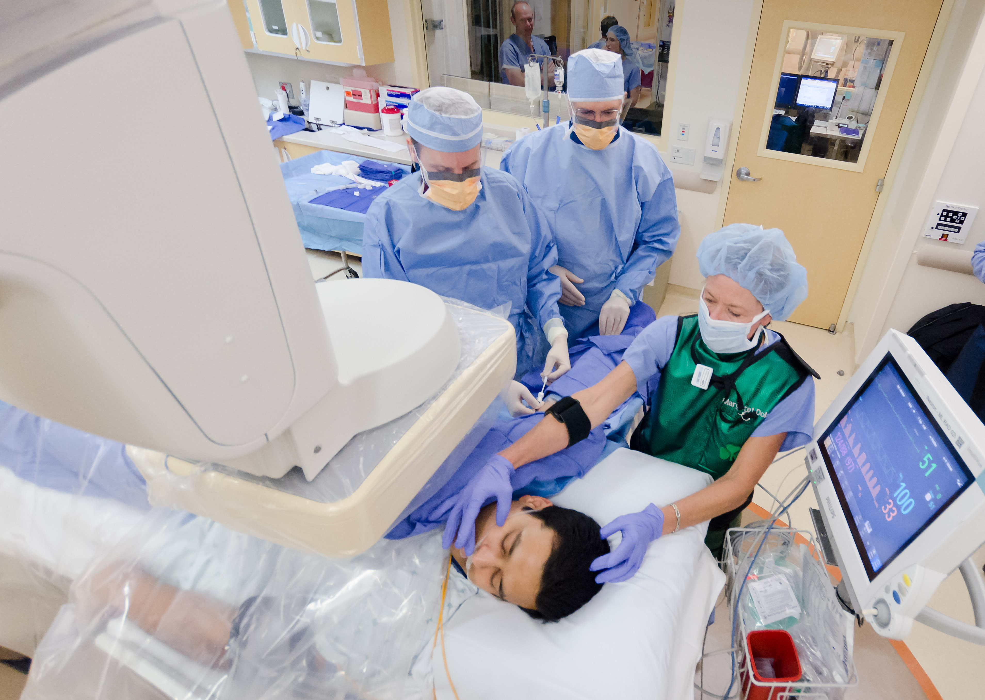 Ellen Makela, RN provides patient support during an IR procedure with Robert Kerlan, MD, FSIR. Ellen Makela, RN proves patient support during an IR procedure with Robert Kerlan, MD, FSIR.