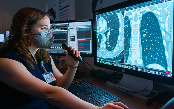 Maya Vella, MD, UCSF Radiologist, reviews CT images for lung cancer Maya Vella, MD, UCSF Radiologist, reviews CT images for lung cancer