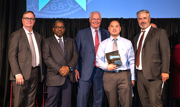 (l-r) Sam Hawgood, MBBS, UCSF Chancellor; Talmadge King, MD, Dean, School of Medicine; Mark Laret, President and Chief Executive Officer, UCSF Health; Ricky Ng, RT, 2019 PRIDE awardee; James Bennan, Chief Operating Officer, Adult Services, UCSF Health