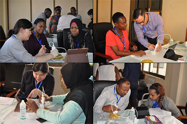 Amie Lee, MD and Tatiana Kelil, MD engaged in breast education in Tanzania. UCSF Global Cancer Program