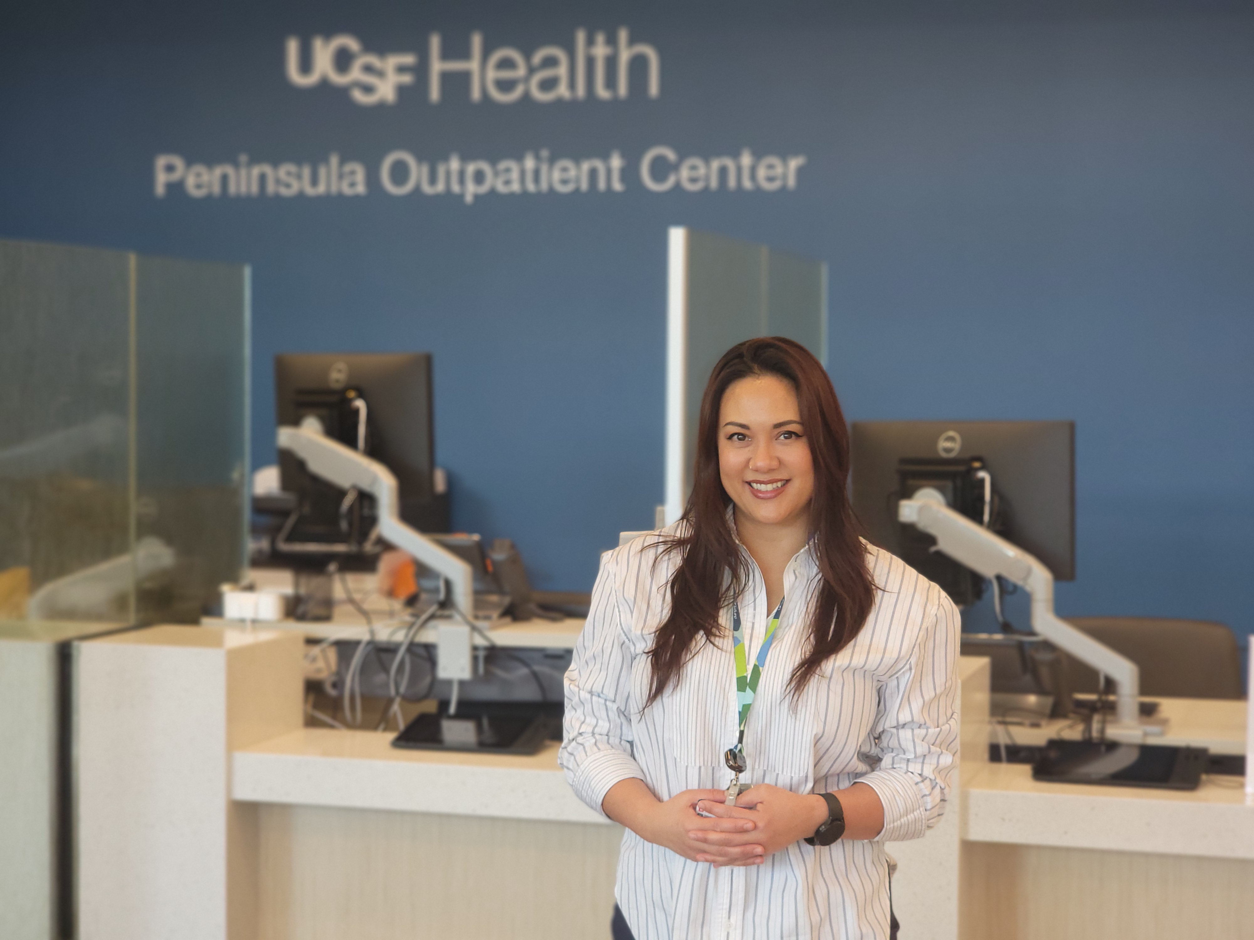 Amy Acuna MBA, RT (R)(M)(ARRT), Peninsula Outpatient Center Supervisor. Woman in lobby at the new Peninsula Outpatient Center.