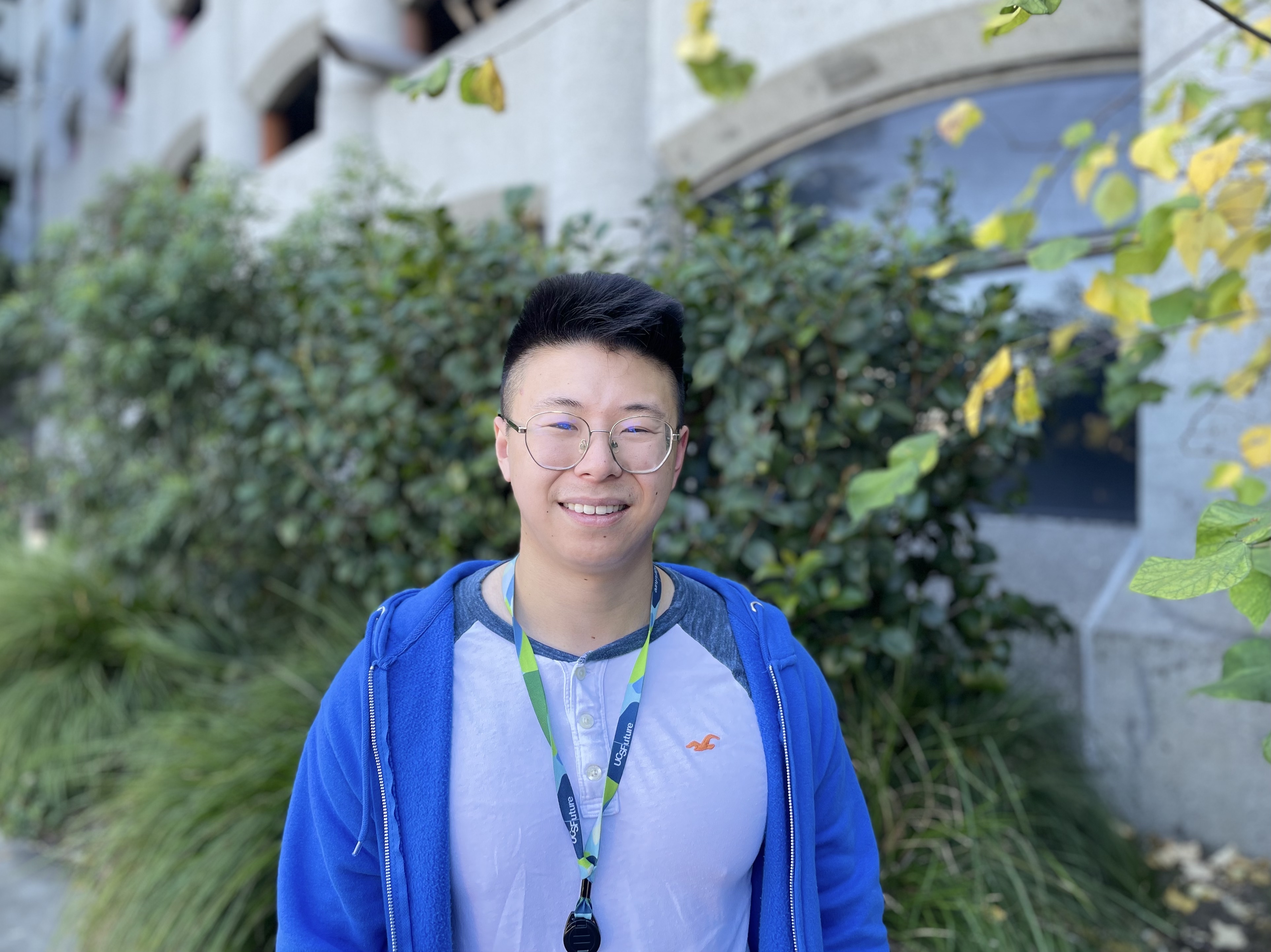 Jesse Huang, Practice Coordinator, at UC Imaging Center (UCIC), Parnassus Heights. Man standing in front of the UC Imaging Center at Parnassus Heights.