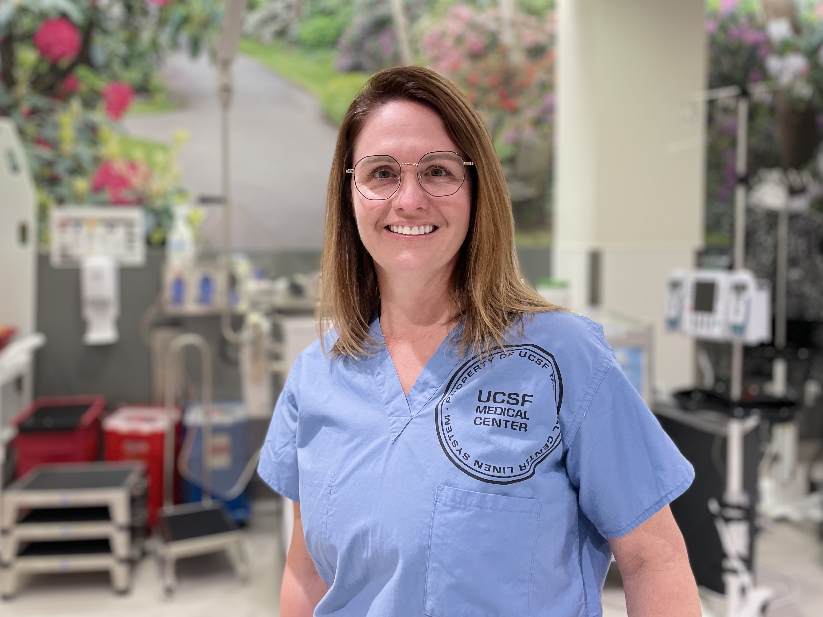 Kelli Kaliban, RN, BSN, at UCSF Bakar Precision Cancer Center. A woman smiling at the camera.