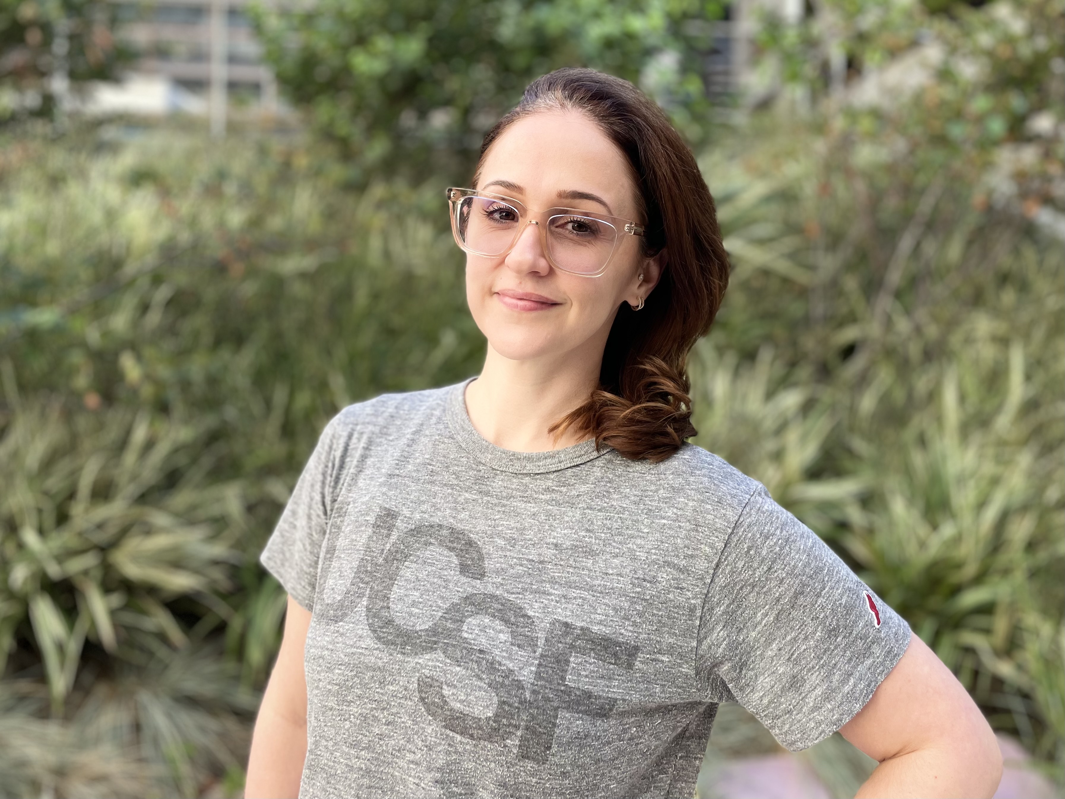 Principal Sonographer Lisa Valentinsson, RDMS, RVT, Parnassus Heights. Woman smiling in courtyard at UCSF Parnassus Heights.