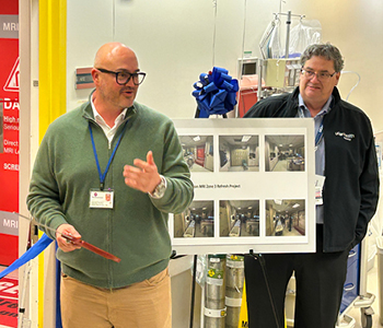 Jeremy Montemayor cutting blue ribbon