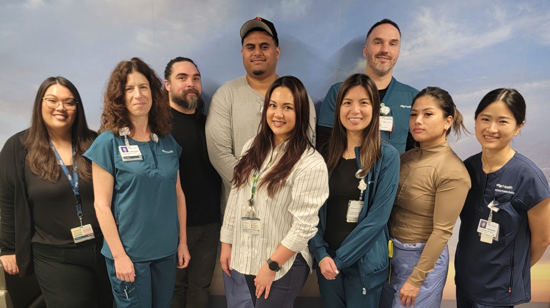 UCSF Health Peninsula Outpatient Center (POPC) Team: Camille Pereda, Loretta Johnson, Mark Johnson, Eli Sausau, Amy Acuna, Monica Goranov, Matthew Olson, Aireen Sarte, and Anna Ramsey. Team of employees at the new UCSF Peninsula Outpatient Center.