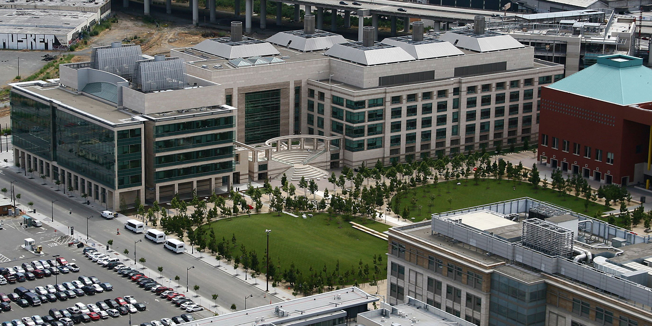Aerial view of Byers Hall at UCSF Mission Bay, showing the building complex and surrounding green space at 1700 4th Street in San Francisco.