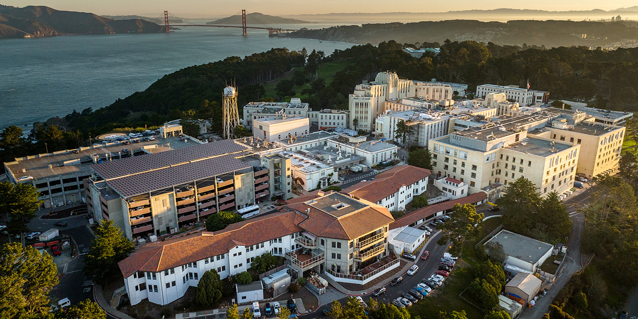Aerial view of the San Francisco VA Medical Center campus at 4150 Clement Street, with surrounding buildings and coastline visible.