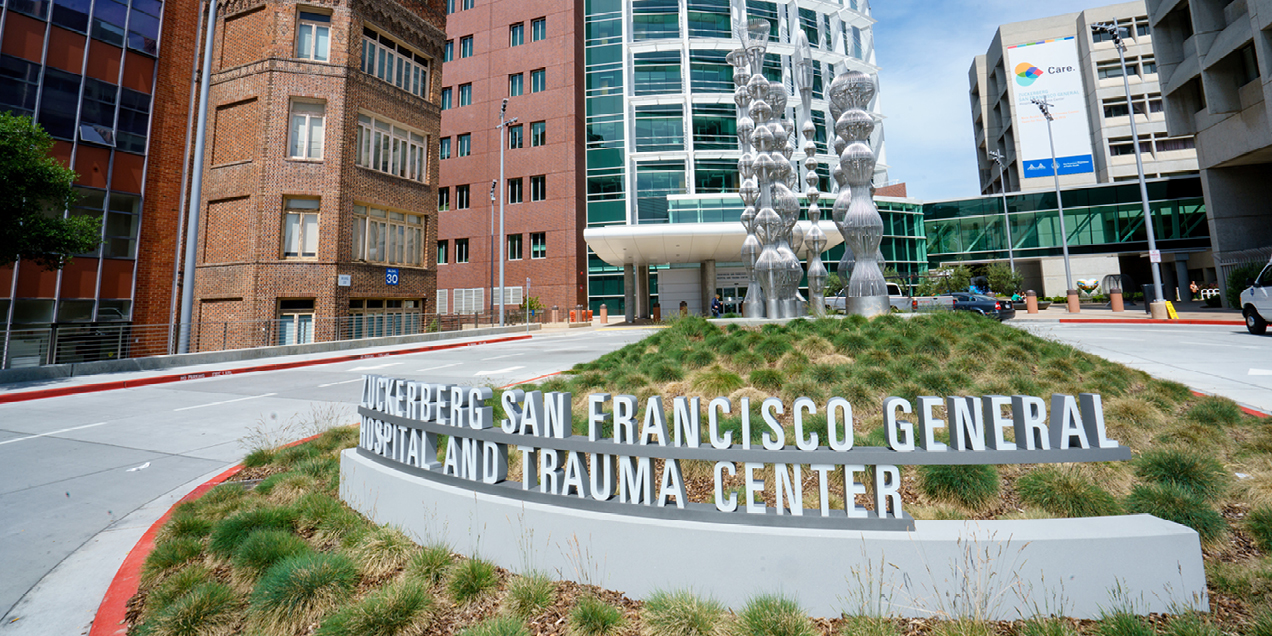 Exterior view of Zuckerberg San Francisco General Hospital and Trauma Center, showing the building facade and signage at 1001 Potrero Avenue in San Francisco.