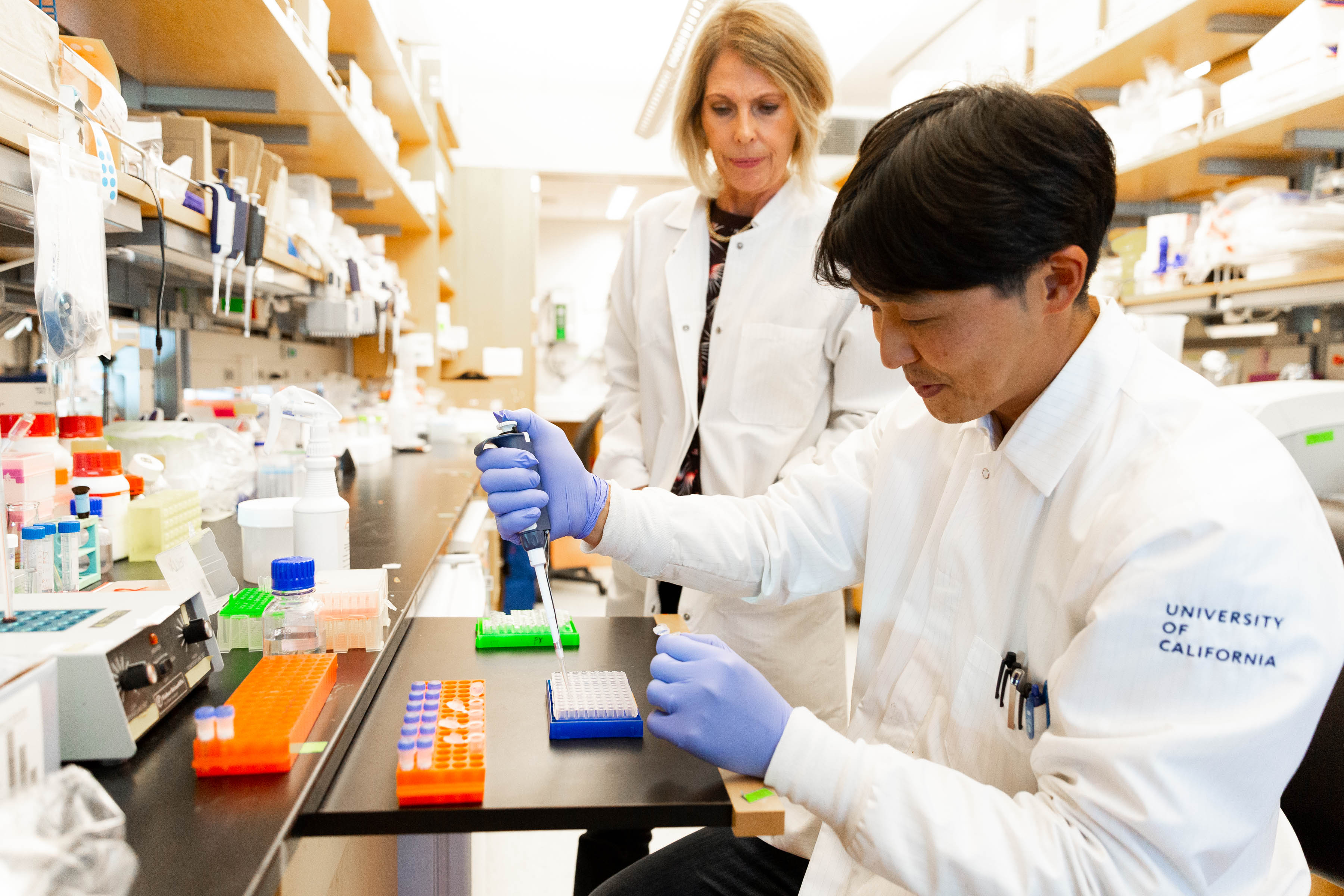 Researchers working in lab