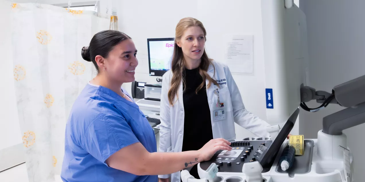 Radiologist and technologist preparing imaging exam