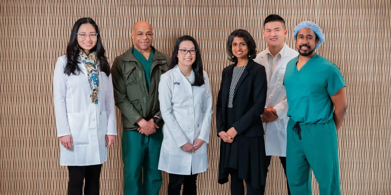 Radiology staff stand together in a clinical setting at Zuckerberg San Francisco General Hospital.