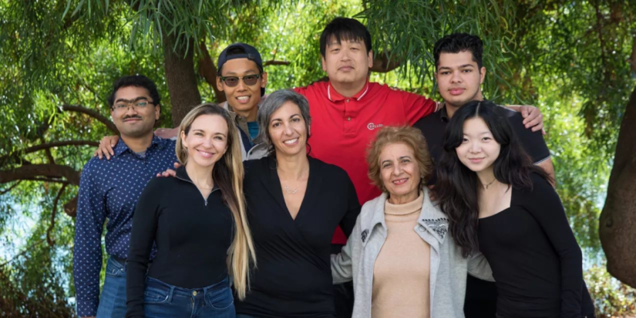 Group photo of Bone Quality Research Lab members standing together outdoors on the UCSF campus.