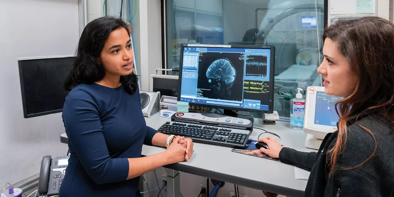 Shabnam Peyvandi, MD, MAS (right), is a pediatric cardiologist at UCSF Benioff Children’s Hospitals and senior author of the study that found that babies who did not respond to increased oxygen and had a severe type of congenital heart disease had significantly smaller brain volumes. Elizabeth George, MBBS (left), is a neuroradiologist seen consulting with Peyvandi. Photo by Marco Sanchez