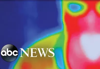 ABC News graphic featuring a false-color thermographic image of a person’s upper body and face, with heat patterns displayed in blue, green, yellow, red, and white.