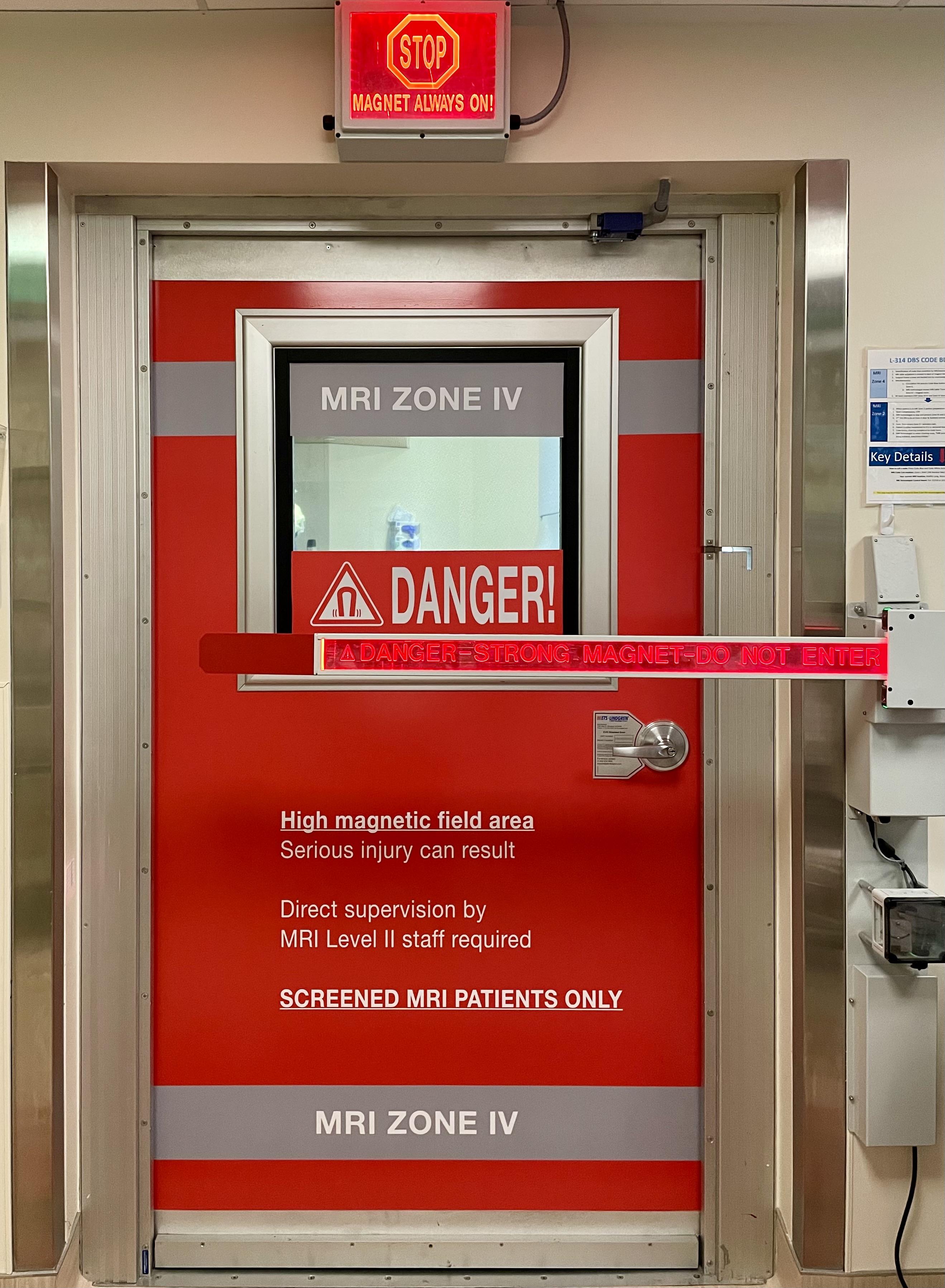 Red MRI zone entry door.