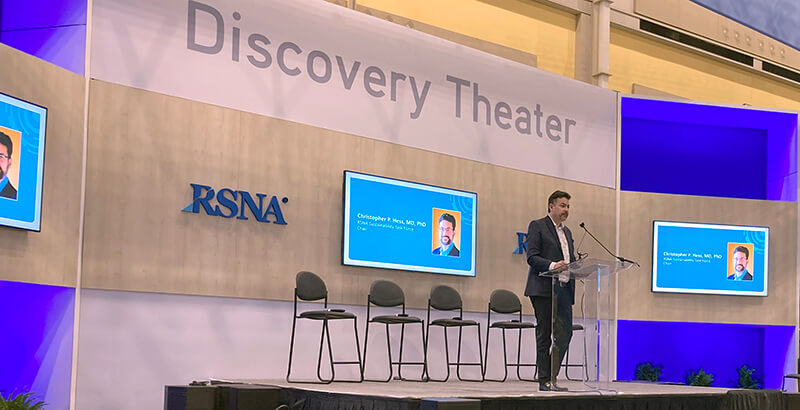 Christopher Hess, MD, PhD addressing audience at RSNA